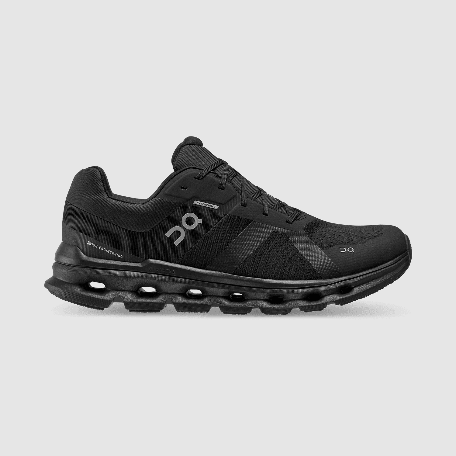 Black On Running athletic shoe with cushioned sole and sleek performance design on a neutral background